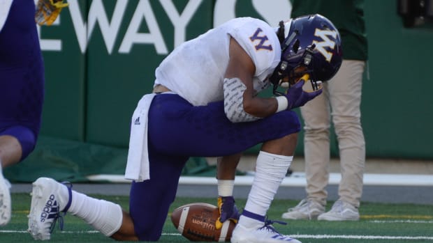 Sep 7, 2019; Fort Collins, CO, USA; Western Illinois Leathernecks wide receiver Tony Tate (1) takes a knee in the end zone after his touchdown reception against Colorado State Rams at Sonny Lubick Field at Canvas Stadium. Mandatory Credit: Michael Madrid-USA TODAY Sports